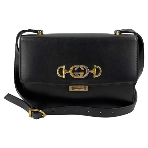 black and silver gucci bag